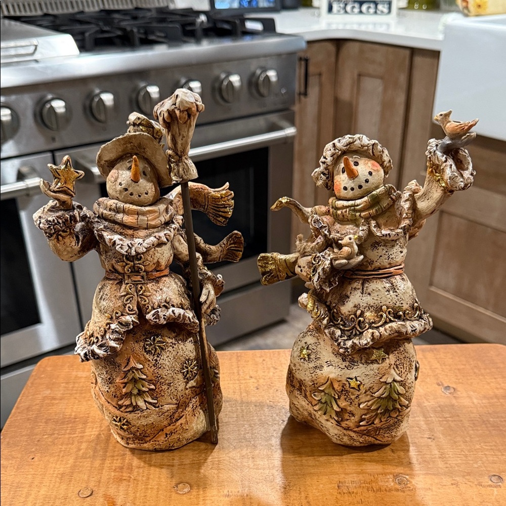 Pair of decorative snowmen. Made of resin.